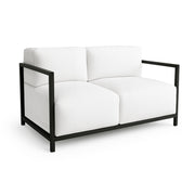 The Dexter Two Seater, a luxury outdoor sofa in a sleek design, perfect for modern patios.